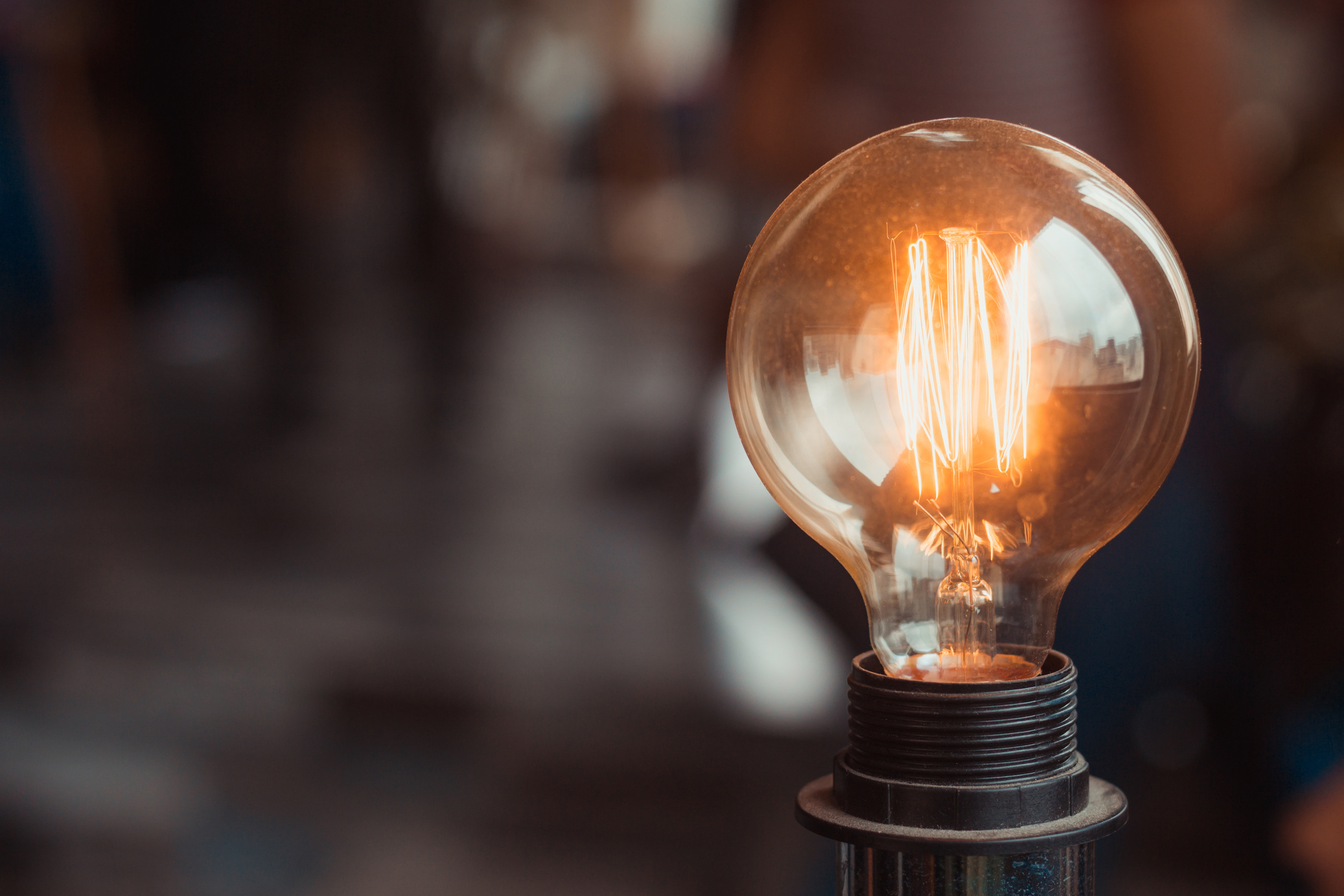 Selective Focus Photography of Turned-on Light Bulb